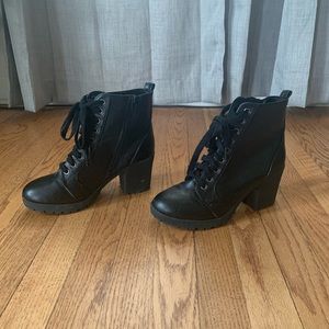 Black combat boots with heel